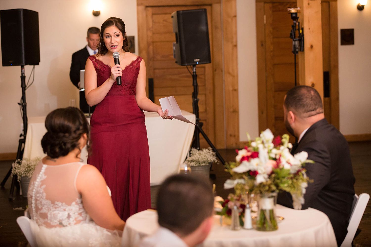 Maid of honor gives her speech to bride and groom