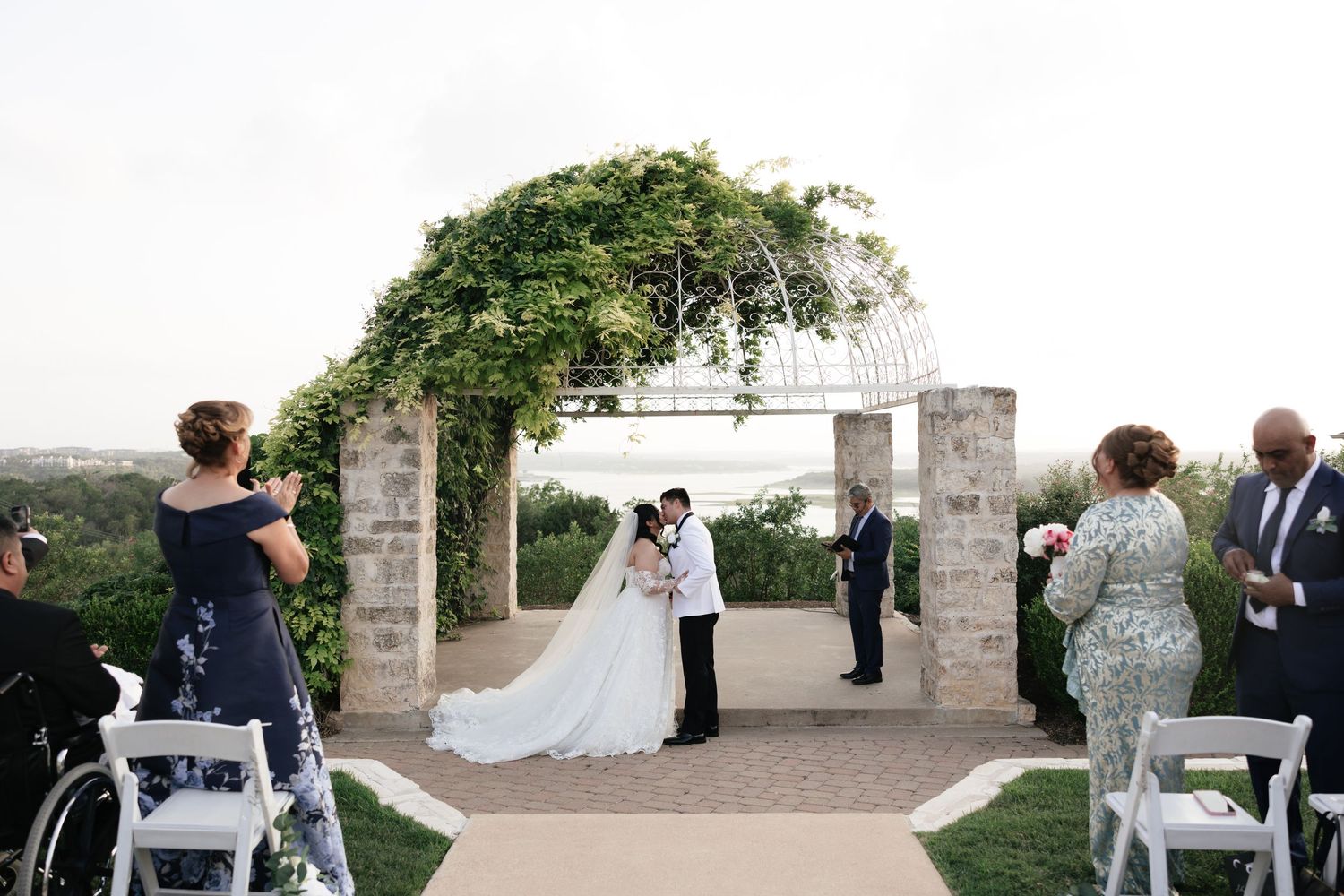 Bride and Grooms First Kiss at Vintage Villas in Austin, Tx