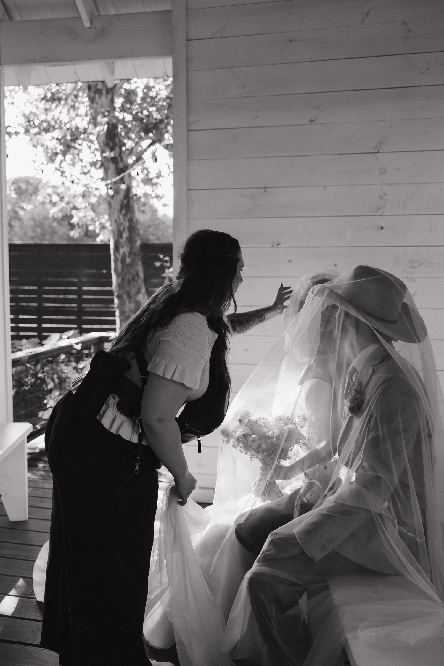 Taylor August Creative photographing couple at The Chapel at Gruene