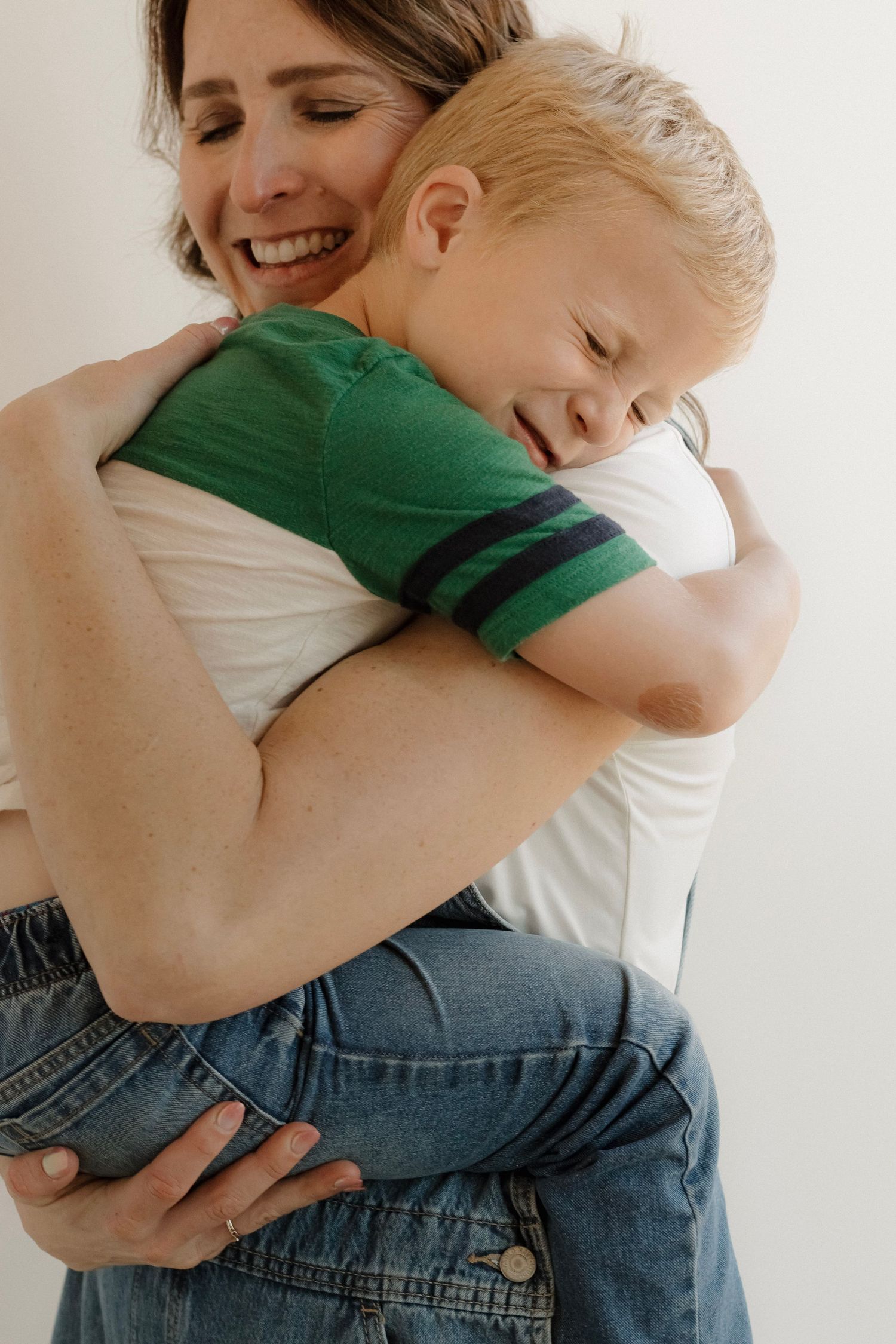 Mom hugging her son during a downtown studio Mommy and Me session in Hastings, Nebraska