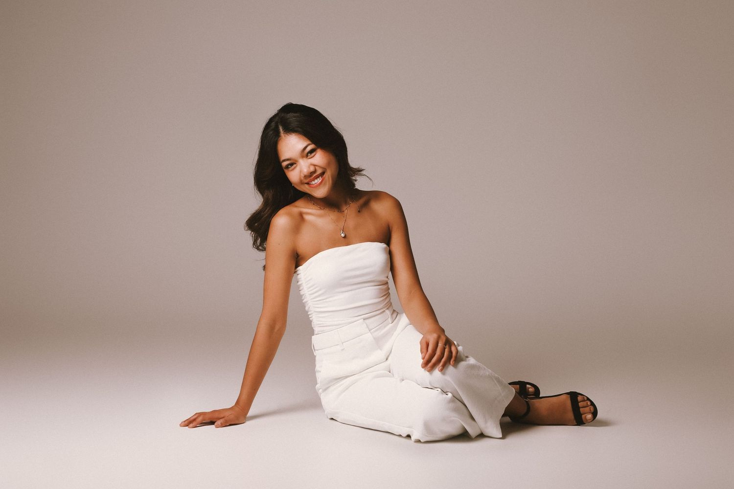 Sydney Personal Branding Photographer captures a branding photography session featuring a creative women in a strapless white dress