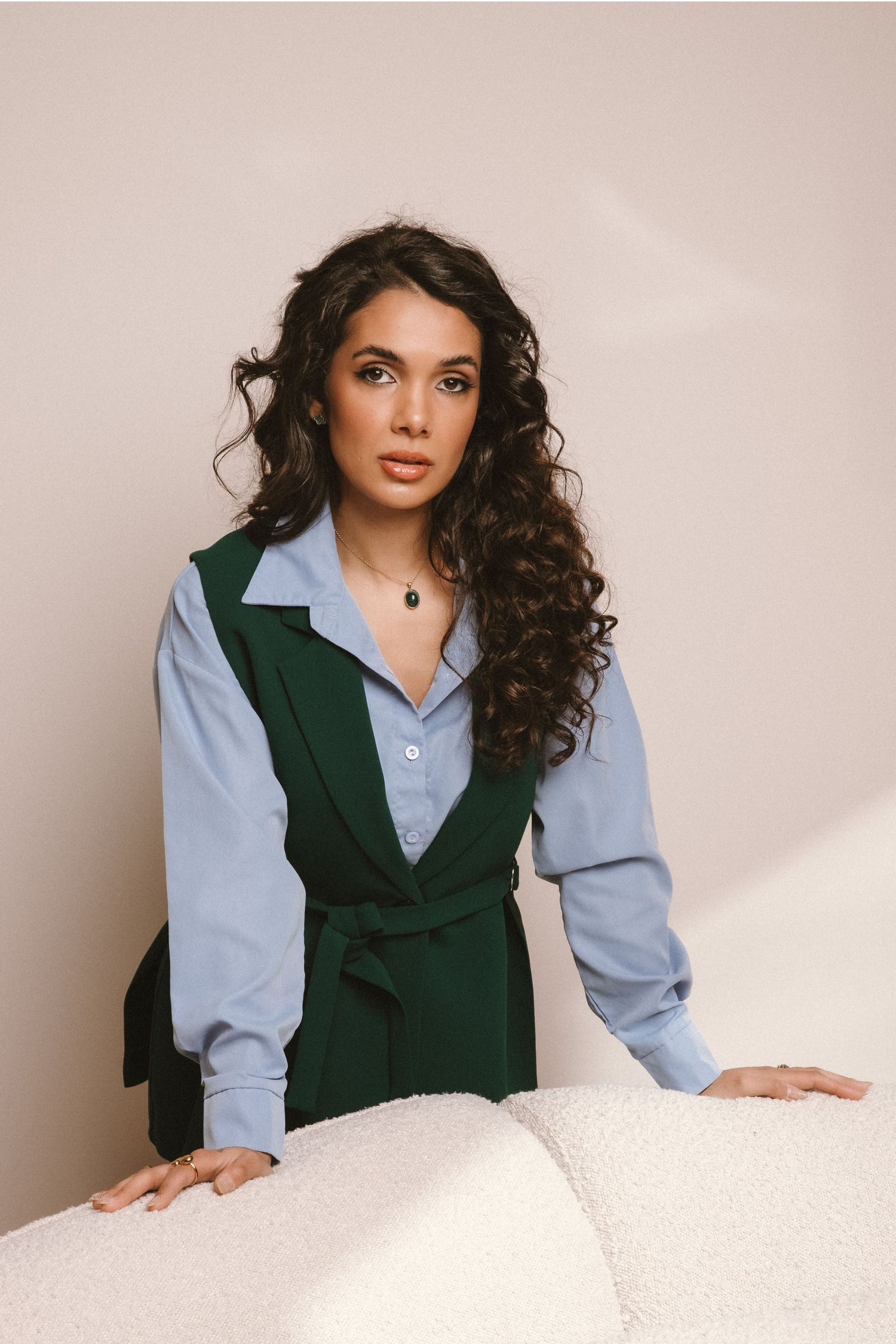 Professional photo of an entrepreneur sophisticatedly posing during a personal branding photoshoot.