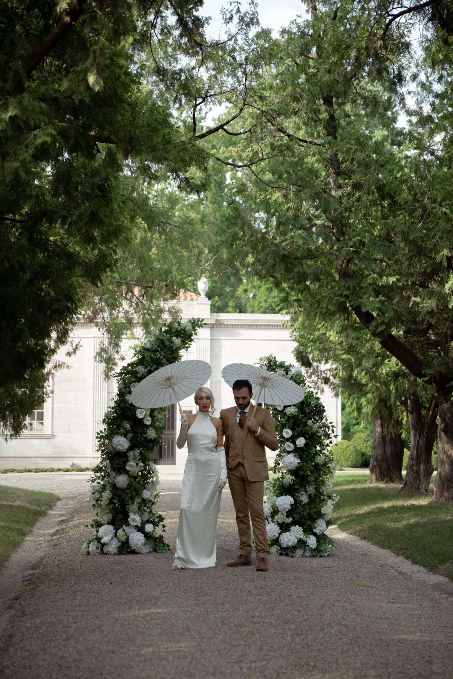 Cincinnati Ohio couple embrace for their wedding portraits