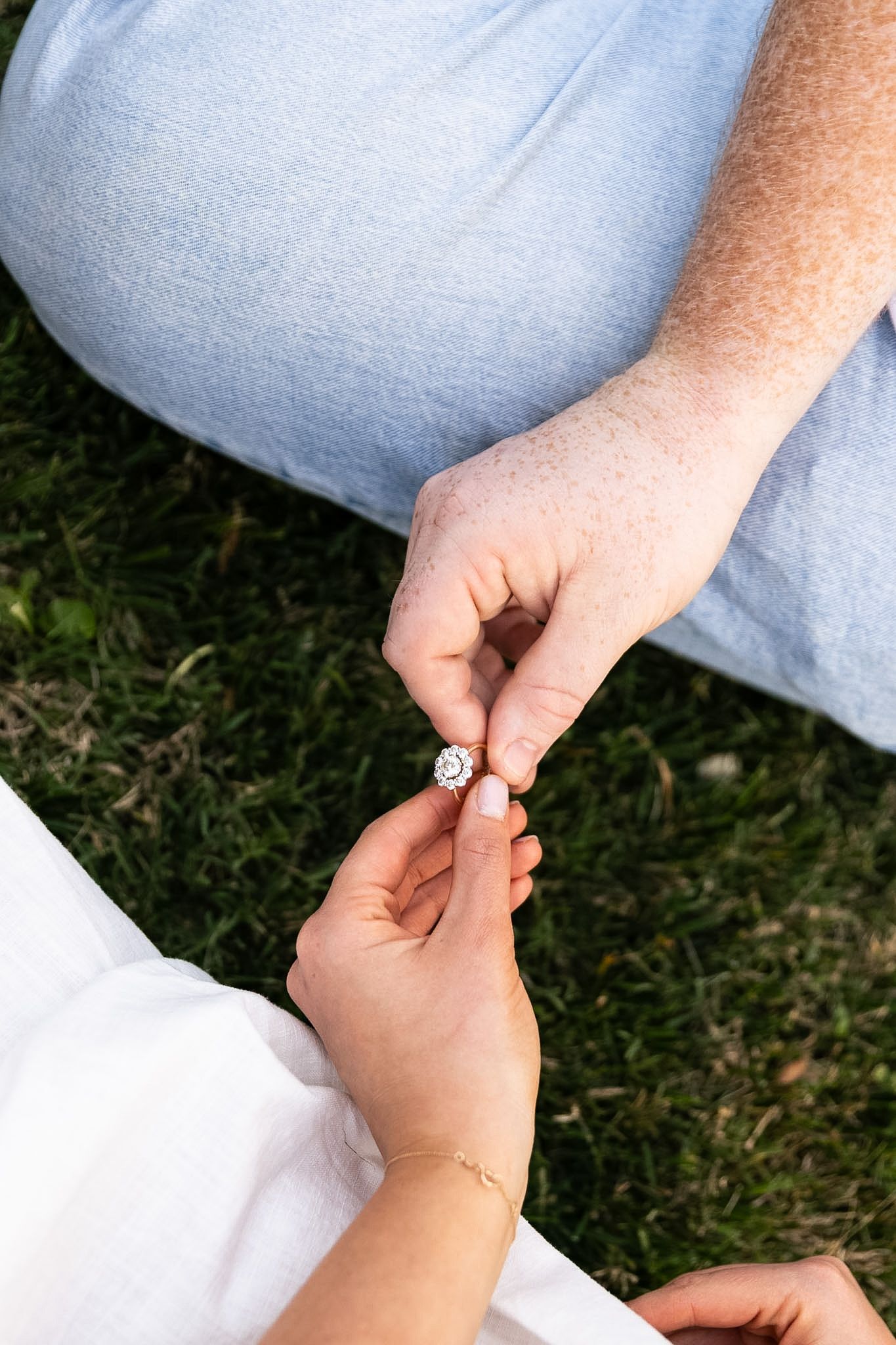 Ring detail while sitting on the grass for a Cincinnati Ohio engagement photo session
