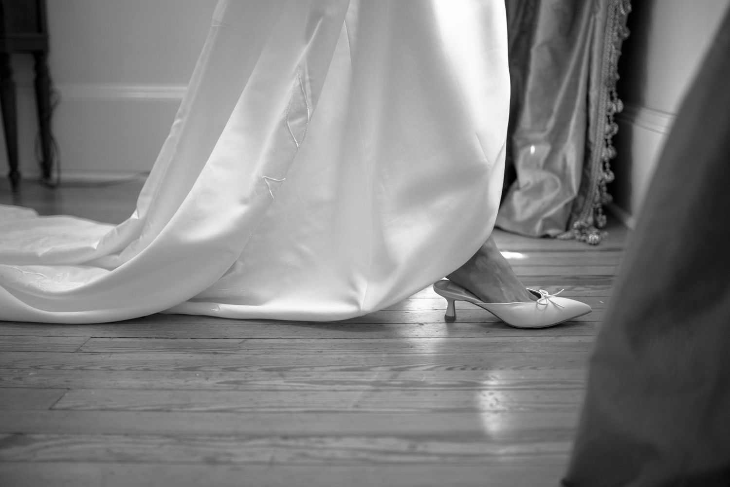 Detail image of bride putting on her shoe in her Cincinnati Ohio home