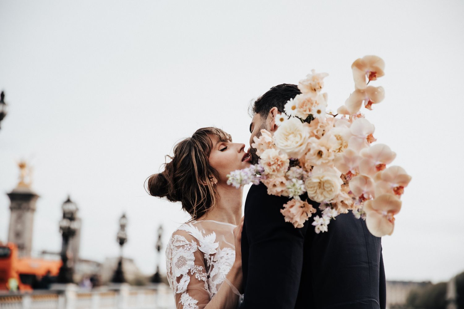 wedding couple share a kiss on the Cincinnati Ohio bridge