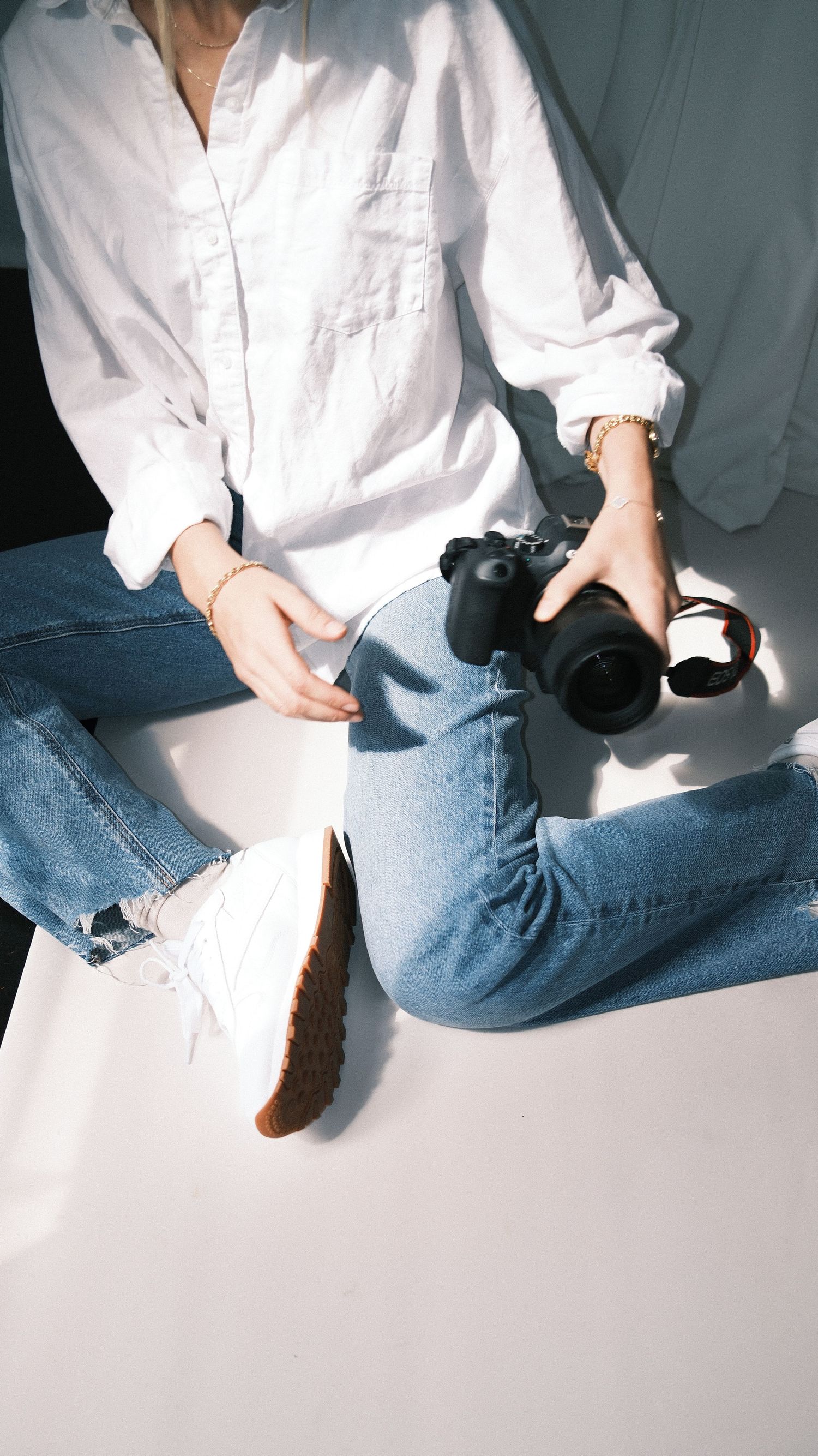 Details of Cincinnati Ohio photographer Natasha Borden posing with camera