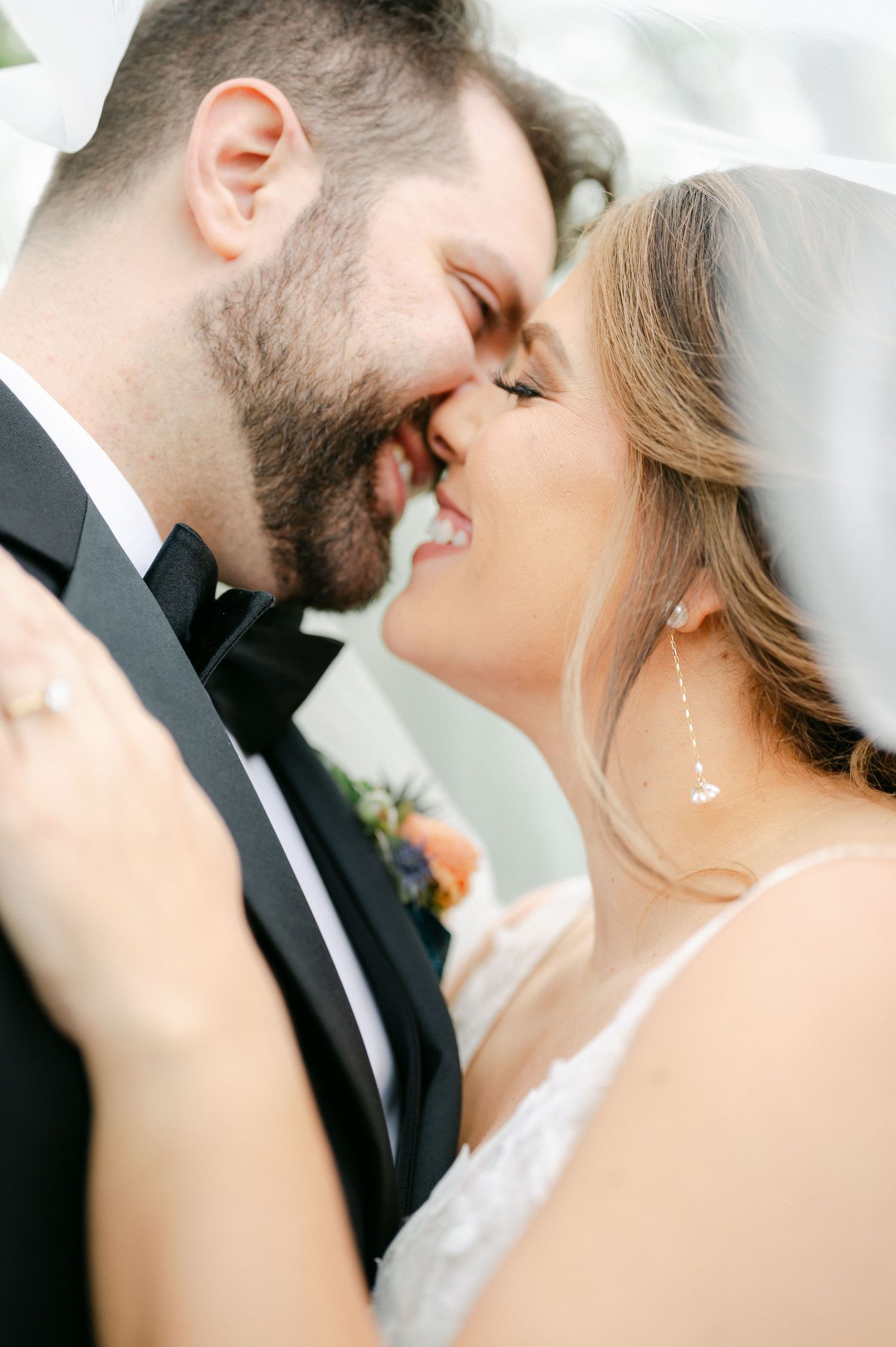 A romantic wedding couple shares an intimate moment in a series of close-up shots showing their tender expressions. - Hyatt Lodge Oak Brook