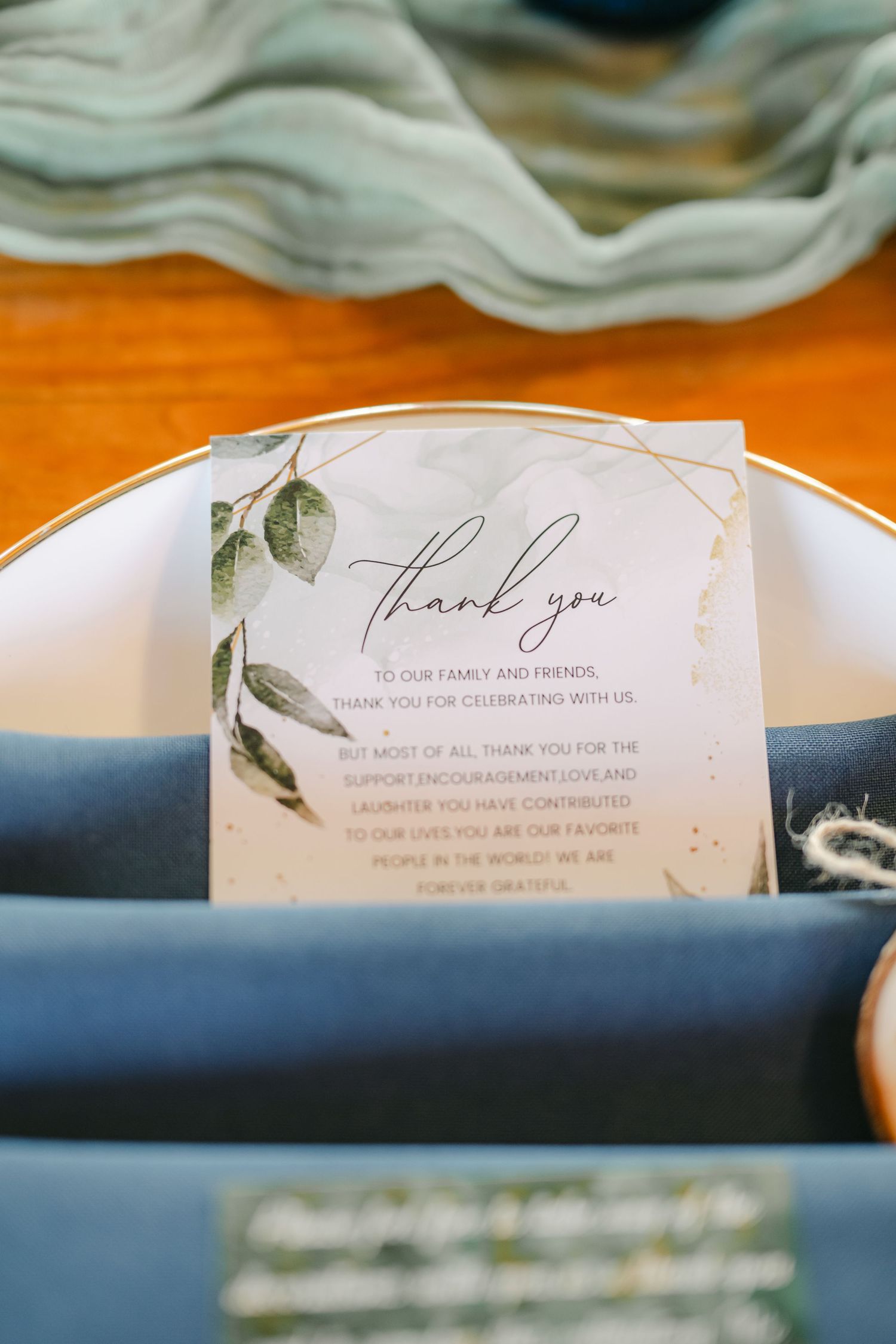 Elegant wedding thank you cards with handwritten calligraphy text and greenery details displayed in a row. - The Brix on the Fox