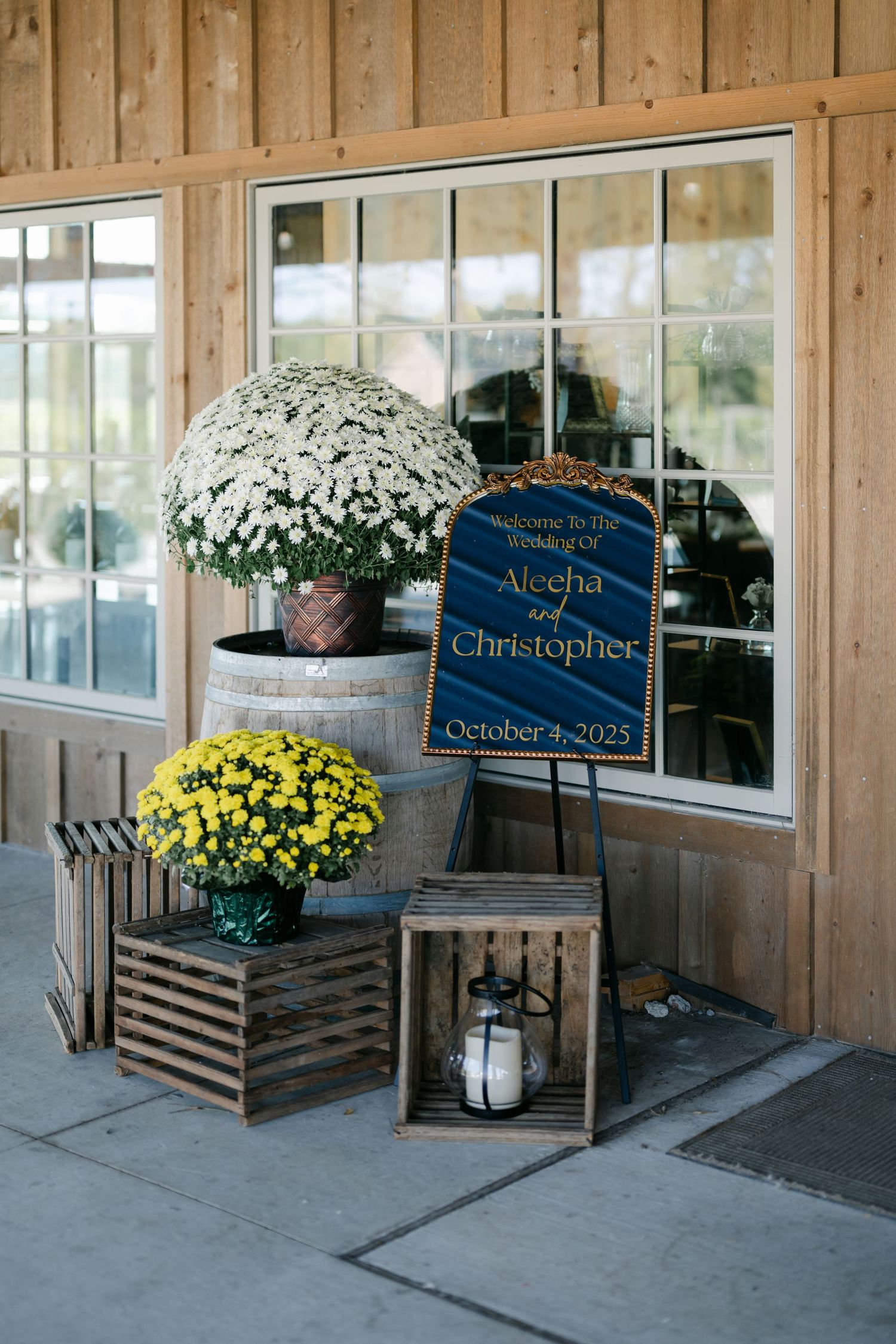 Rustic wedding welcome sign, displayed with white and yellow wooden crates. - Youngblood Vineyard Wedding Bloomington Indiana