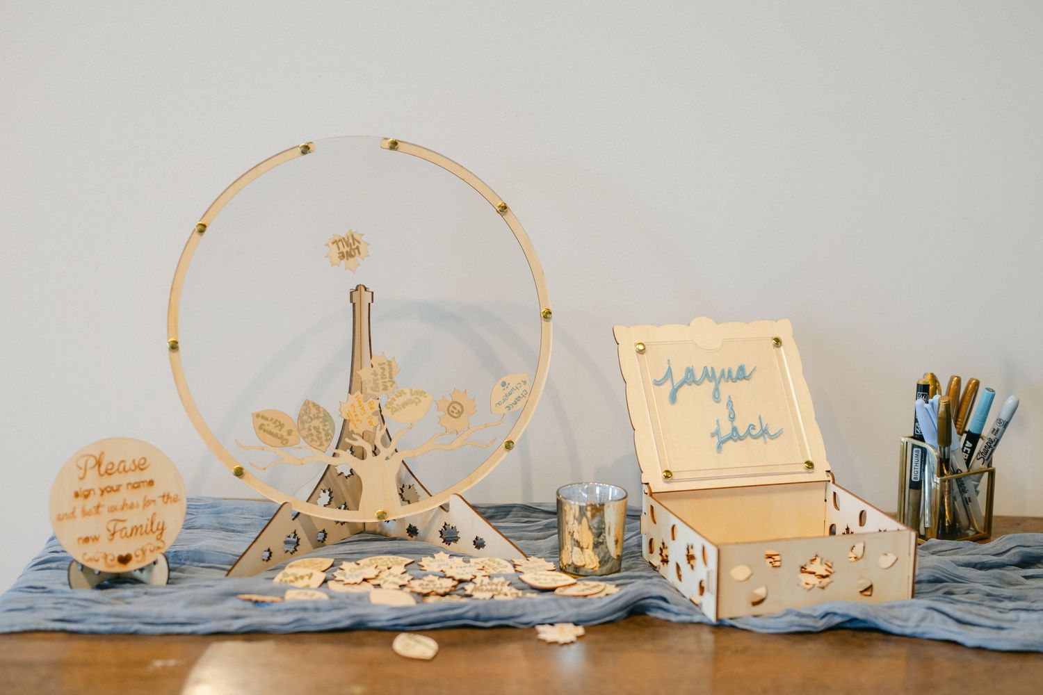 A series of delicate wire and paper boat sculptures arranged in a minimalist artistic display. - The Brix on the Fox