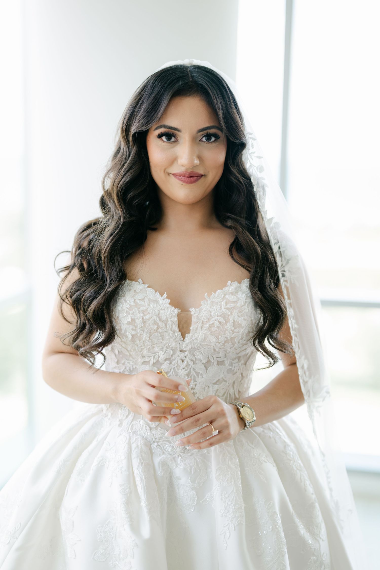 Three elegant bridal portraits showing a white lace wedding dress with off-shoulder design in a bright studio setting. - LM Studio Chicago