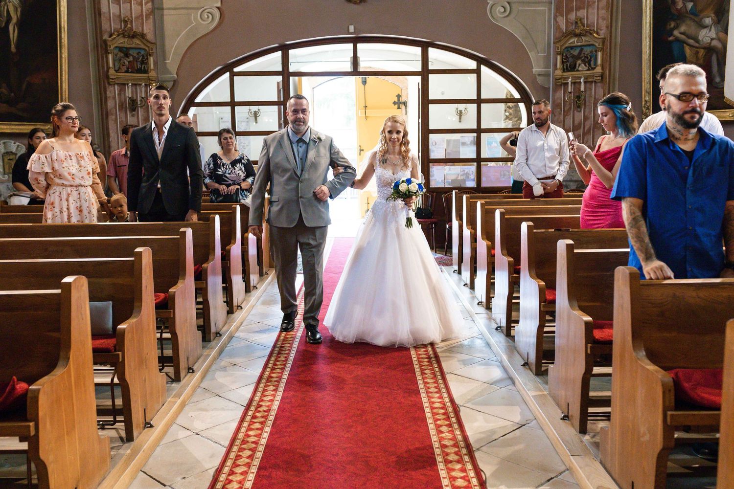 A series of wedding ceremony photos showing church pews and aisle decorations with a red carpet runner.
