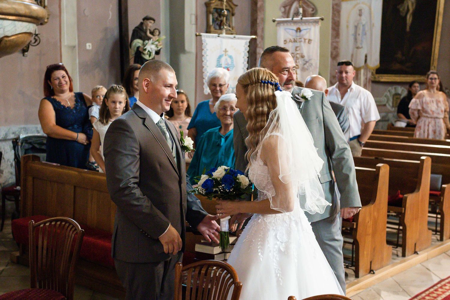 A wedding ceremony collage showing various moments inside a church with guests and a bride in a white gown.