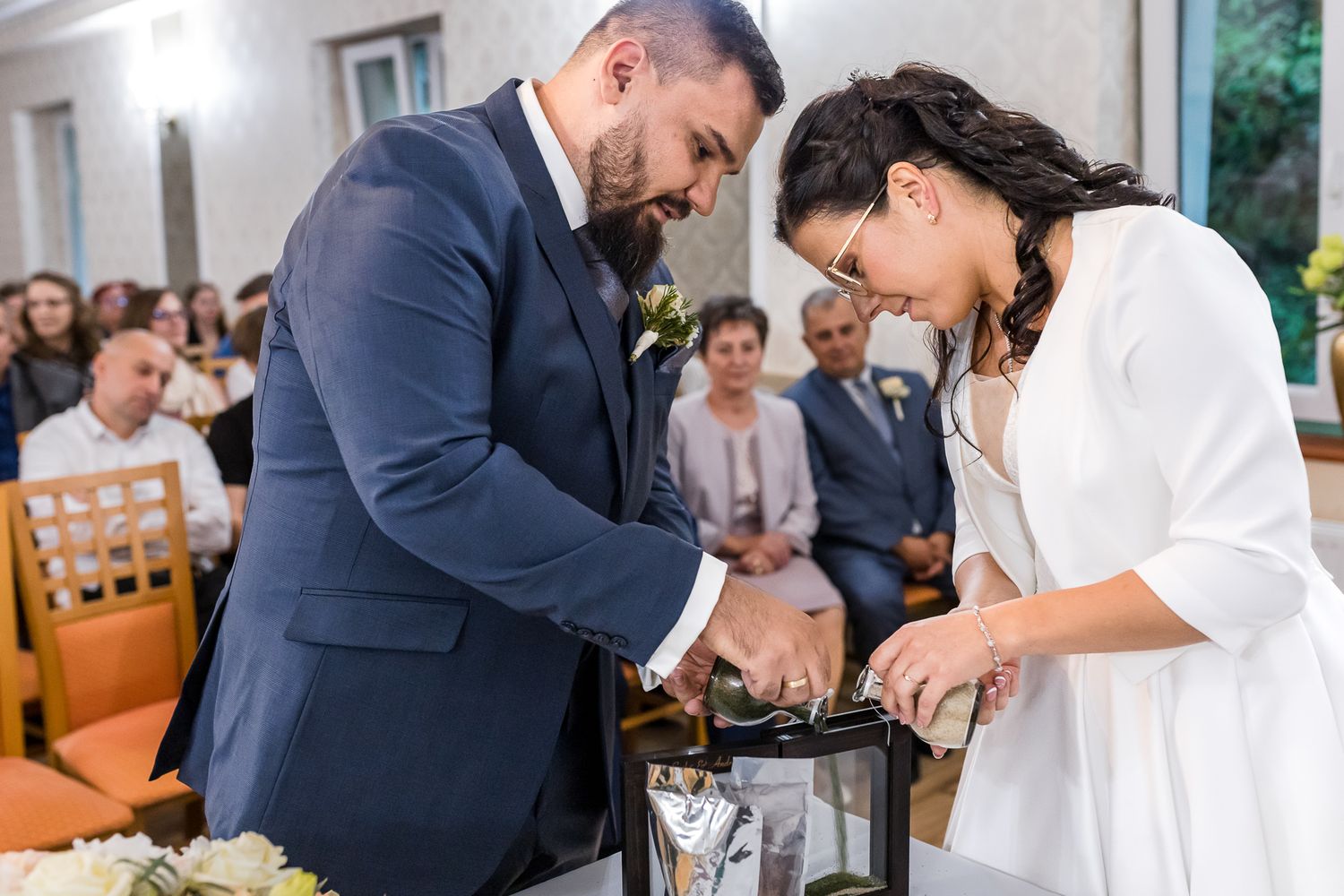A series of wedding photos showing the couple cutting their cake and sharing intimate moments during their reception celebration.