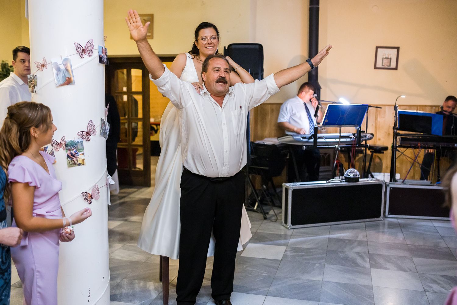 A series of dance floor moments at a wedding reception showing people dancing and celebrating together.