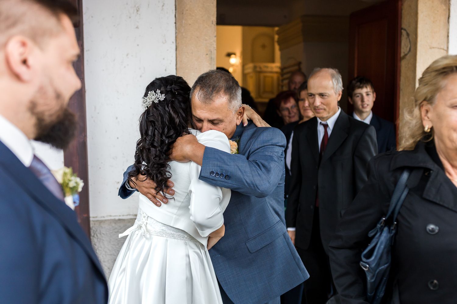 A collection of wedding photos showing couples embracing and celebrating during a ceremony.