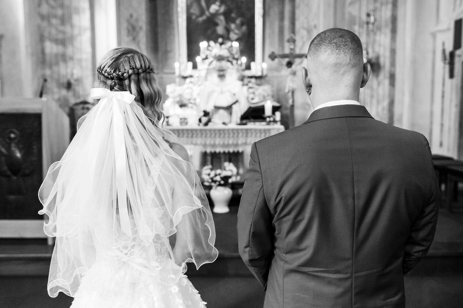 Black and white photo collage showing five wedding moments with couples and wedding parties in formal attire.