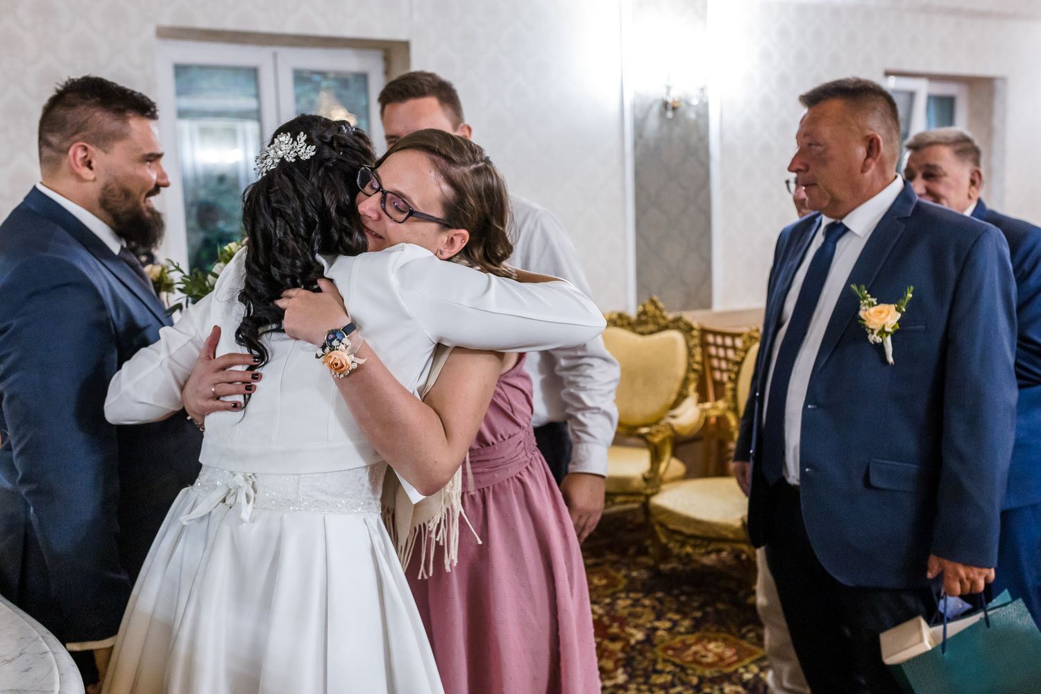 A series of romantic wedding moments captured in a filmstrip style collage showing tender embraces and celebrations.