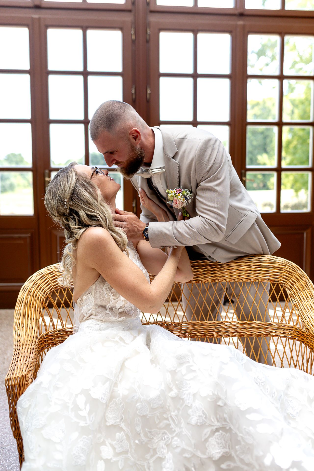 A romantic wedding photo sequence shows a couple sharing a tender moment on a wicker loveseat.