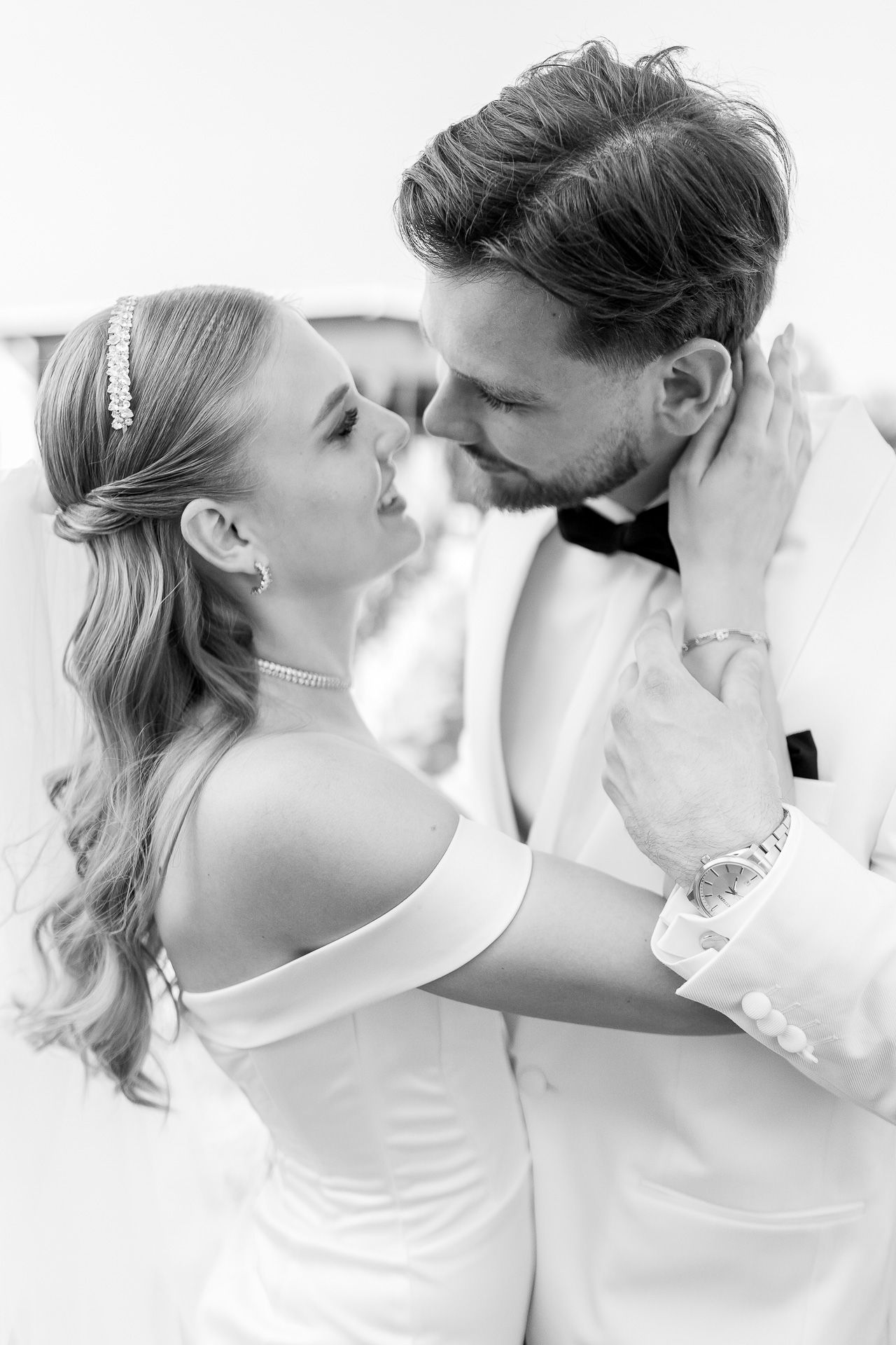 Black and white series captures intimate wedding moments with artistic flair.