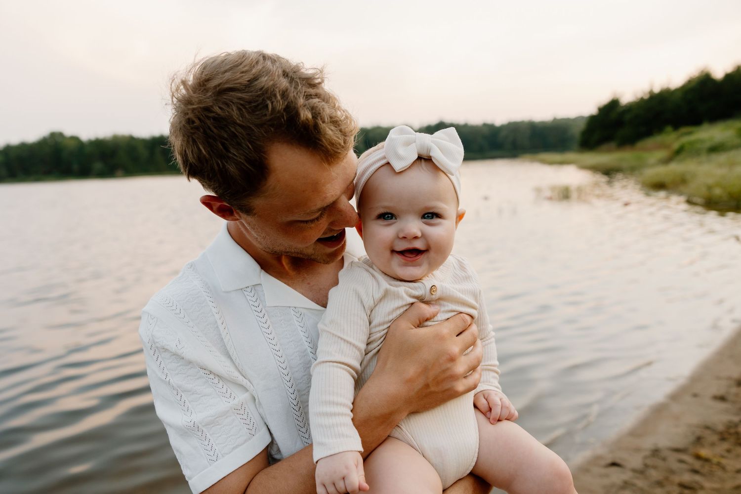 A series of candid beach photos showing tender moments between parent and child at sunset by the water.