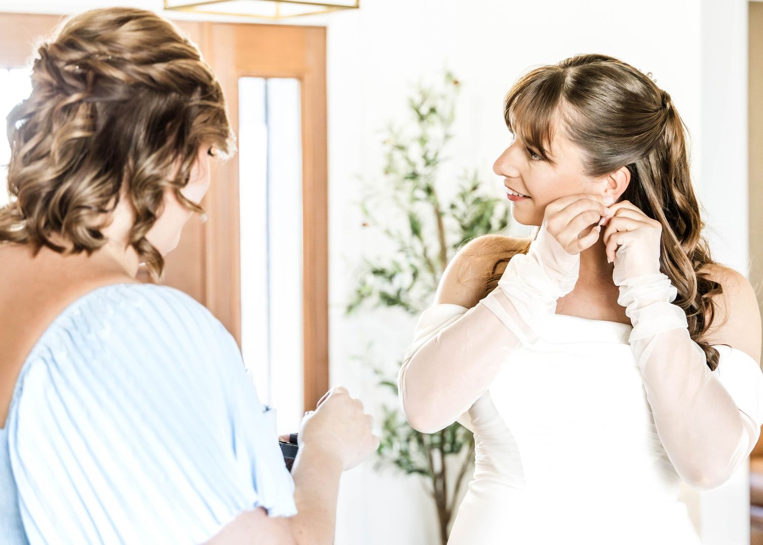 A series of wedding preparation photos showing hair styling and getting ready moments in a bright sunlit room.