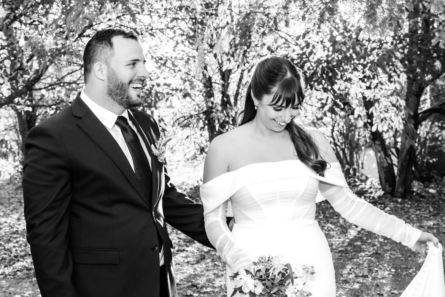 A series of black and white wedding portraits showing tender moments between newlyweds.
