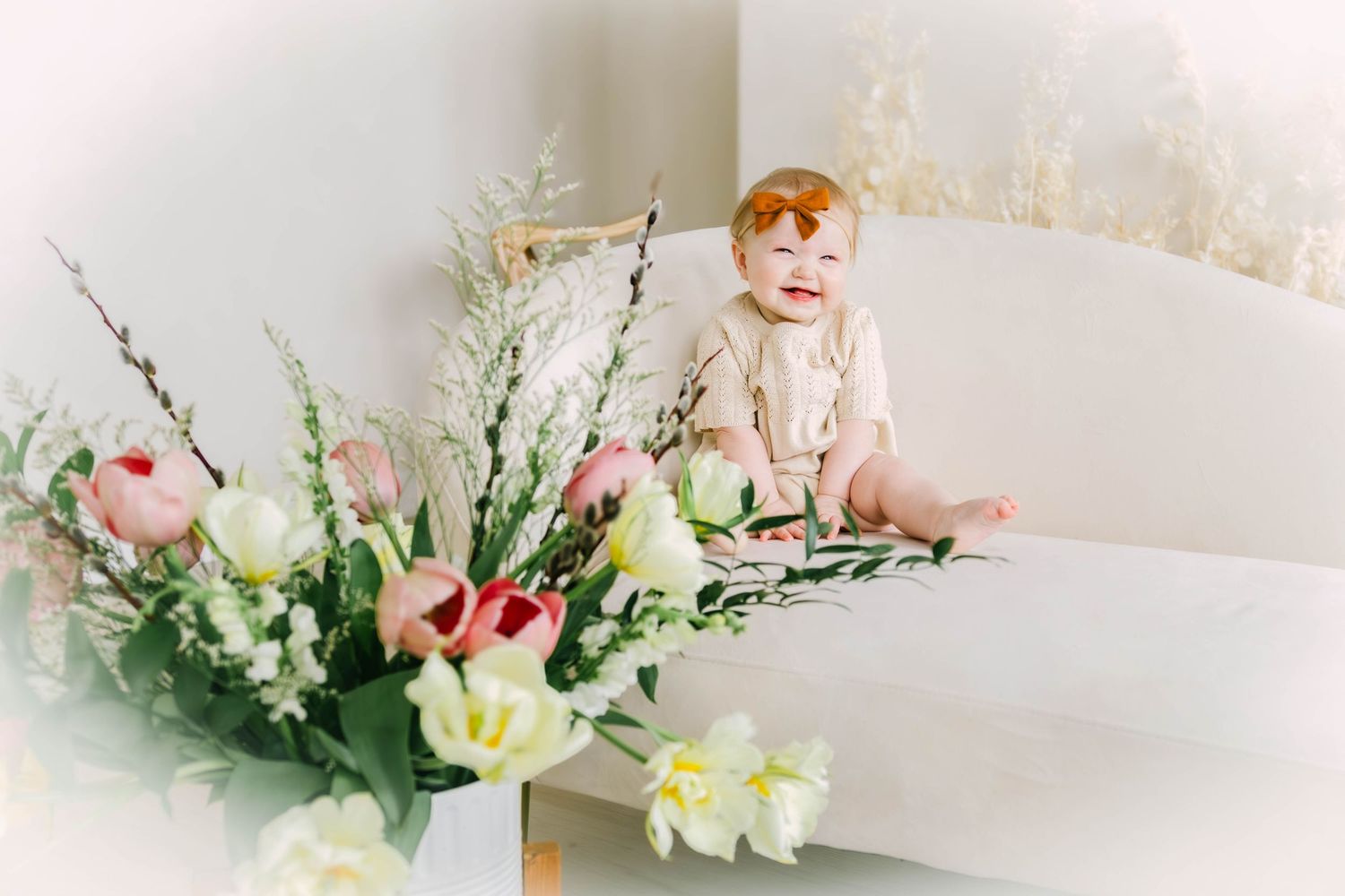 A series of soft, dreamy photos featuring spring flowers and delicate decor arrangements against a light background.