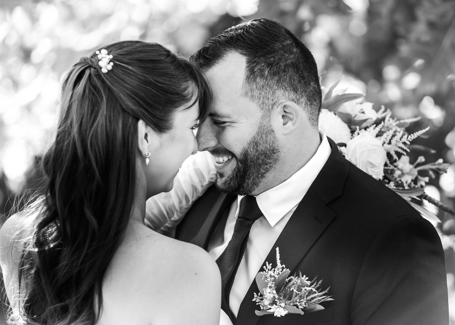 Series of romantic black and white close-up wedding portraits showing tender moments.