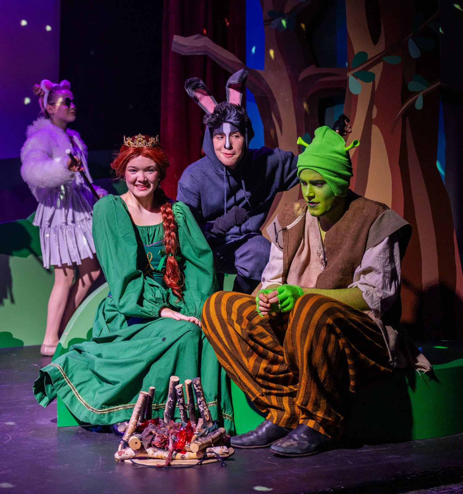 Teen actors performing in a comedic musical theatre production in Kirkland.