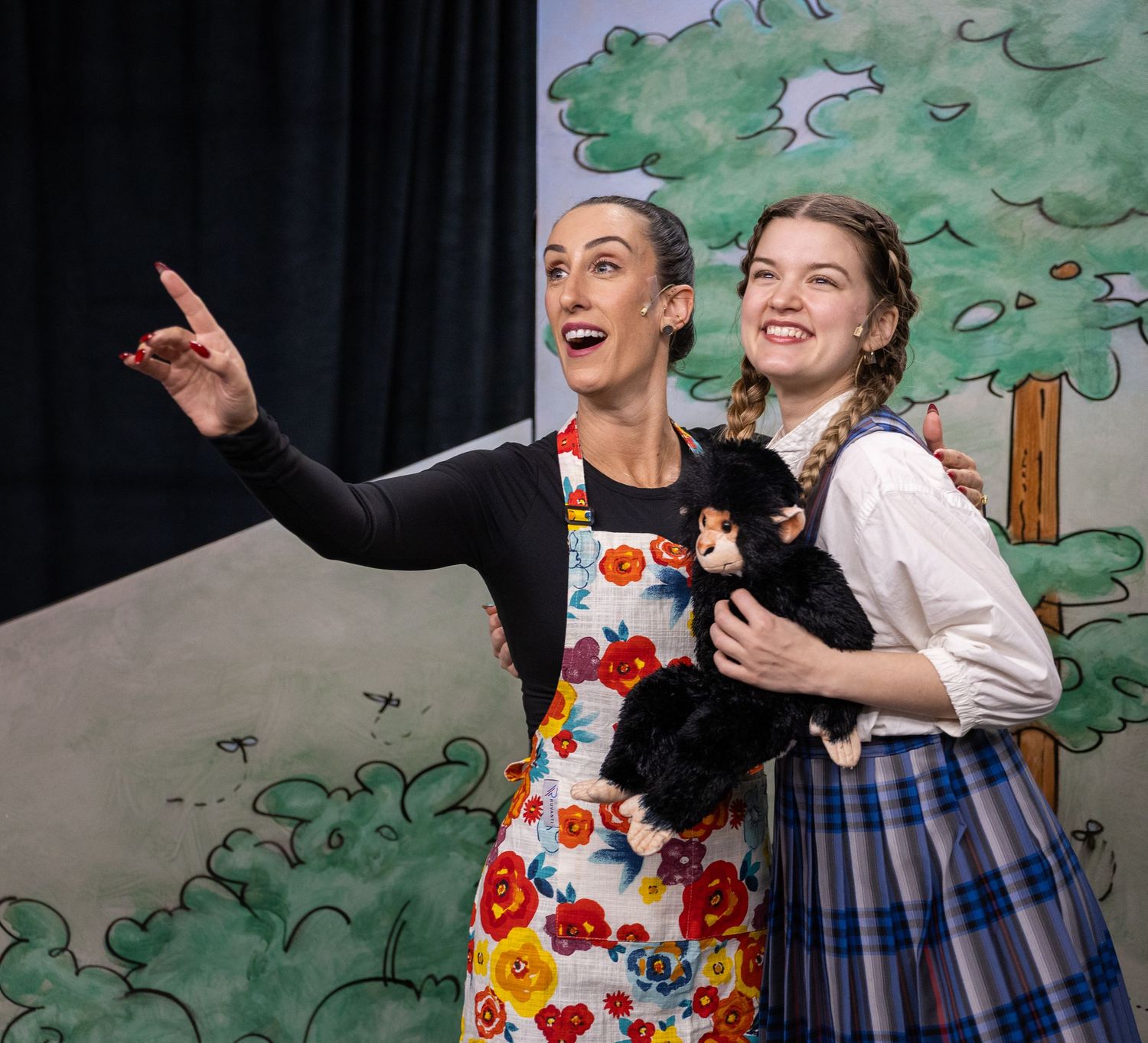 Stage scene with actors in character under lighting in Kirkland