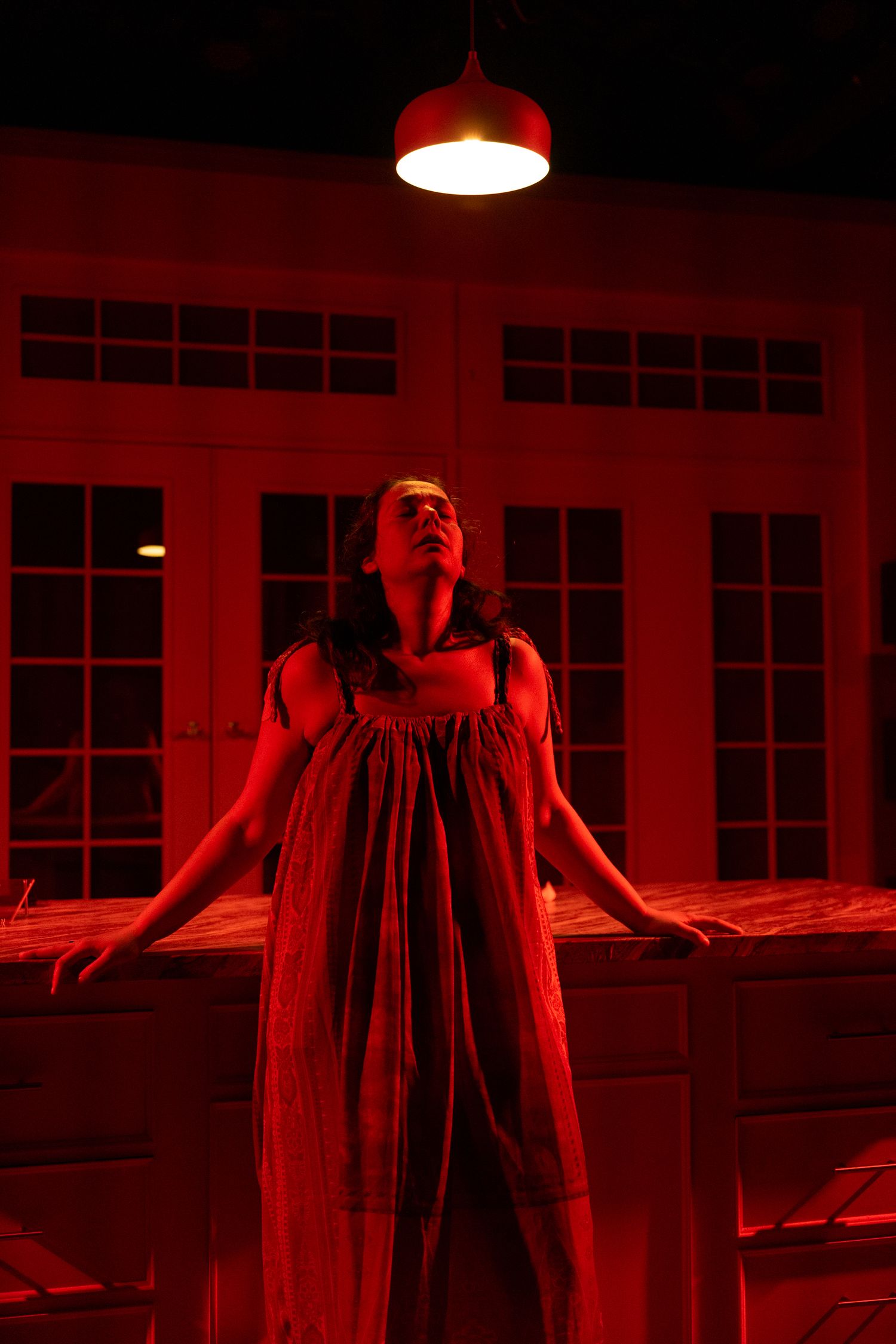 Stage performance with dramatic lighting in Seattle theatre