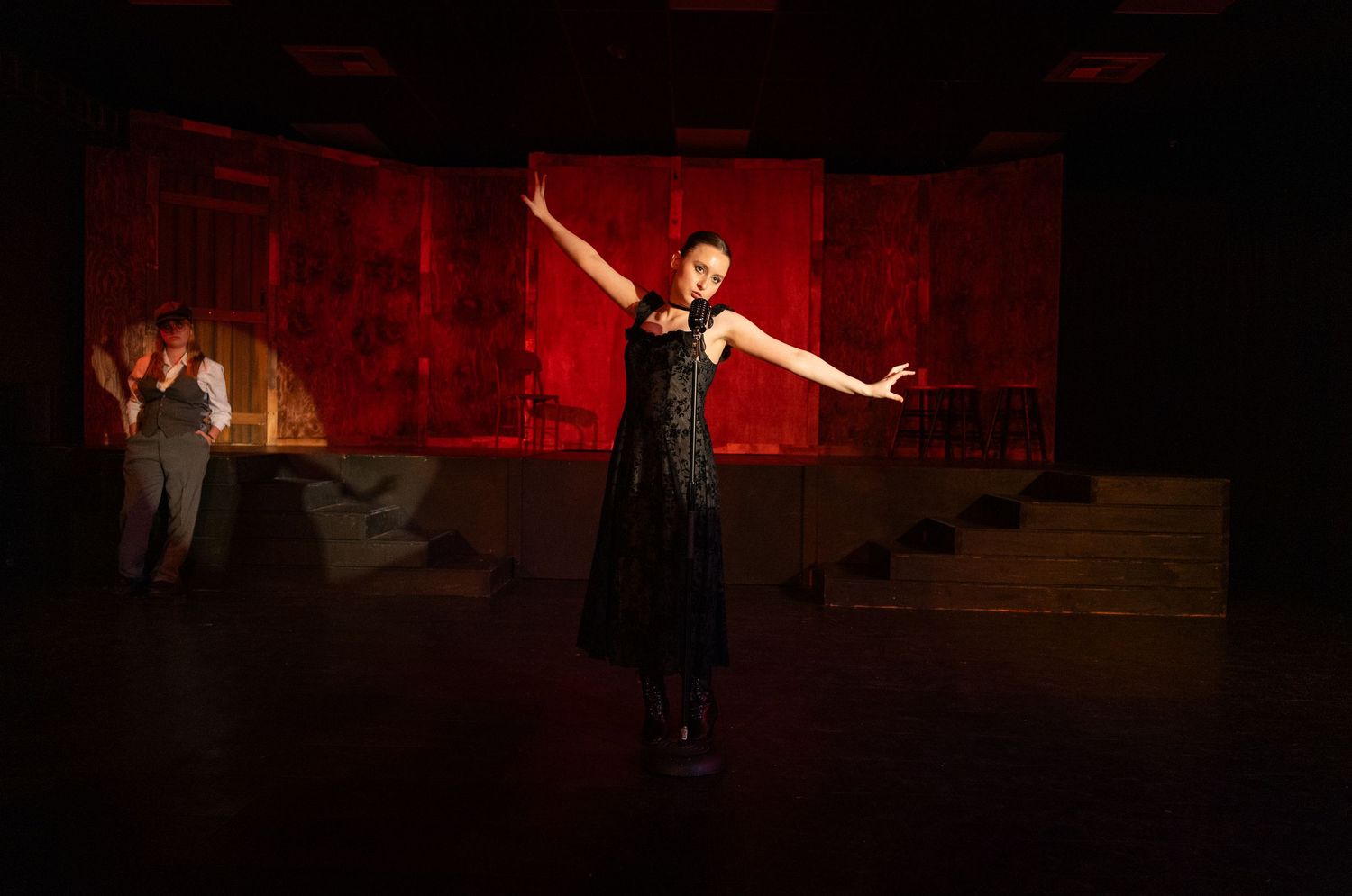 Actor dancing and singing on stage in Redmond musical theatre