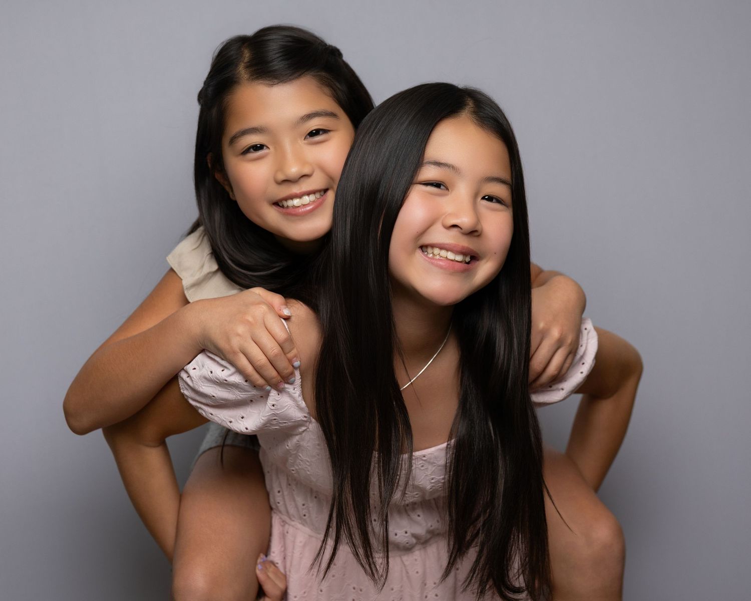 Sibling portrait with natural expression in Kirkland