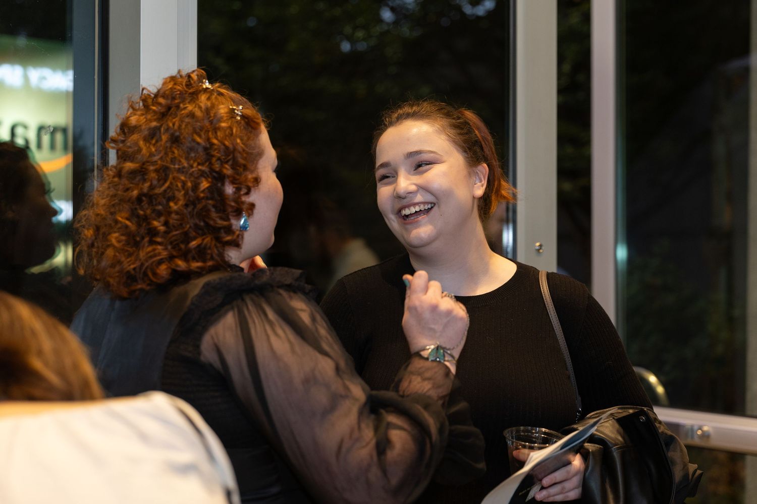 Natural interaction between attendees at event in Bellevue