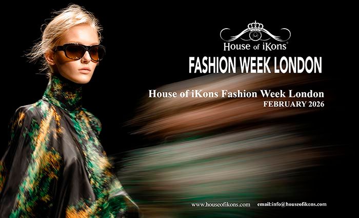 A fashion model walks the runway in a green and gold patterned outfit during London Fashion Week.