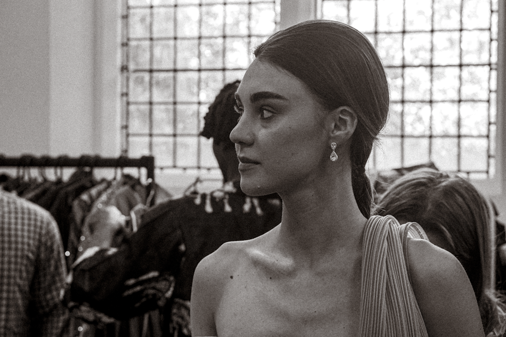 Lorena a model with sleek updo captured backstage at London Fashion Day. Fashion Photographer - Martin Japheth