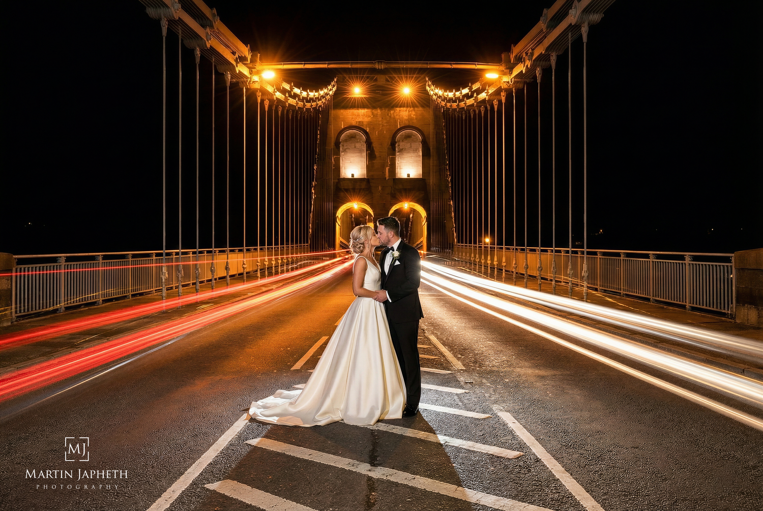Menai Bridge Photoshoot -  a long exposure taken at night. Wedding Photographer Martin Japheth.