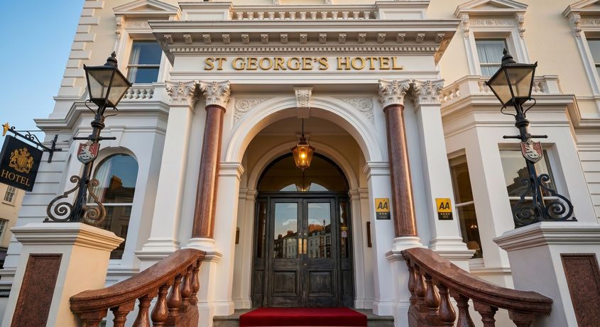 Grand entrance of St George's Hotel featuring ornate architecture, red carpet stairs, Martin Japheth Photography