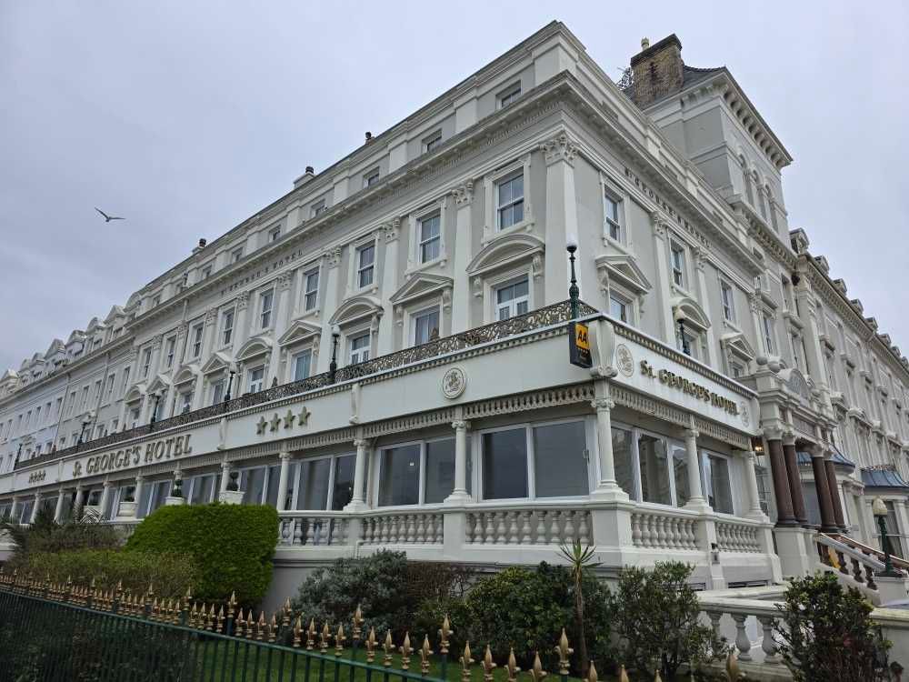 Architectural details of a St. George's Hotel in llandudno with ornate balconies and decorative trim along the facade.