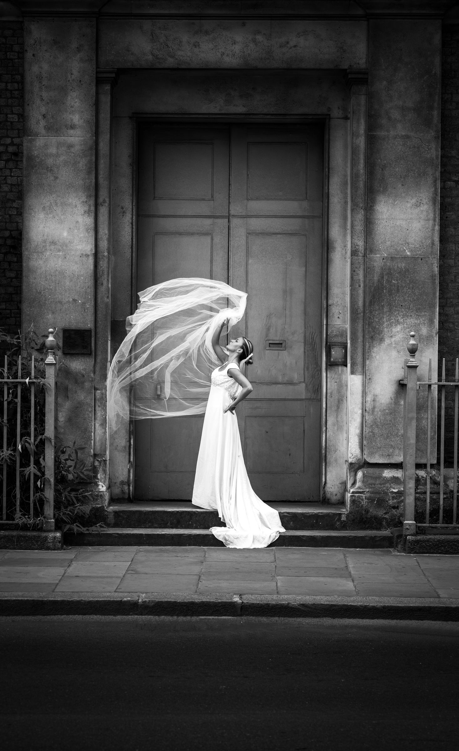 Bride's veil in motion at St Dunstan in the Tower Bridge Road, London bridal portrait | Martin Japheth Photography