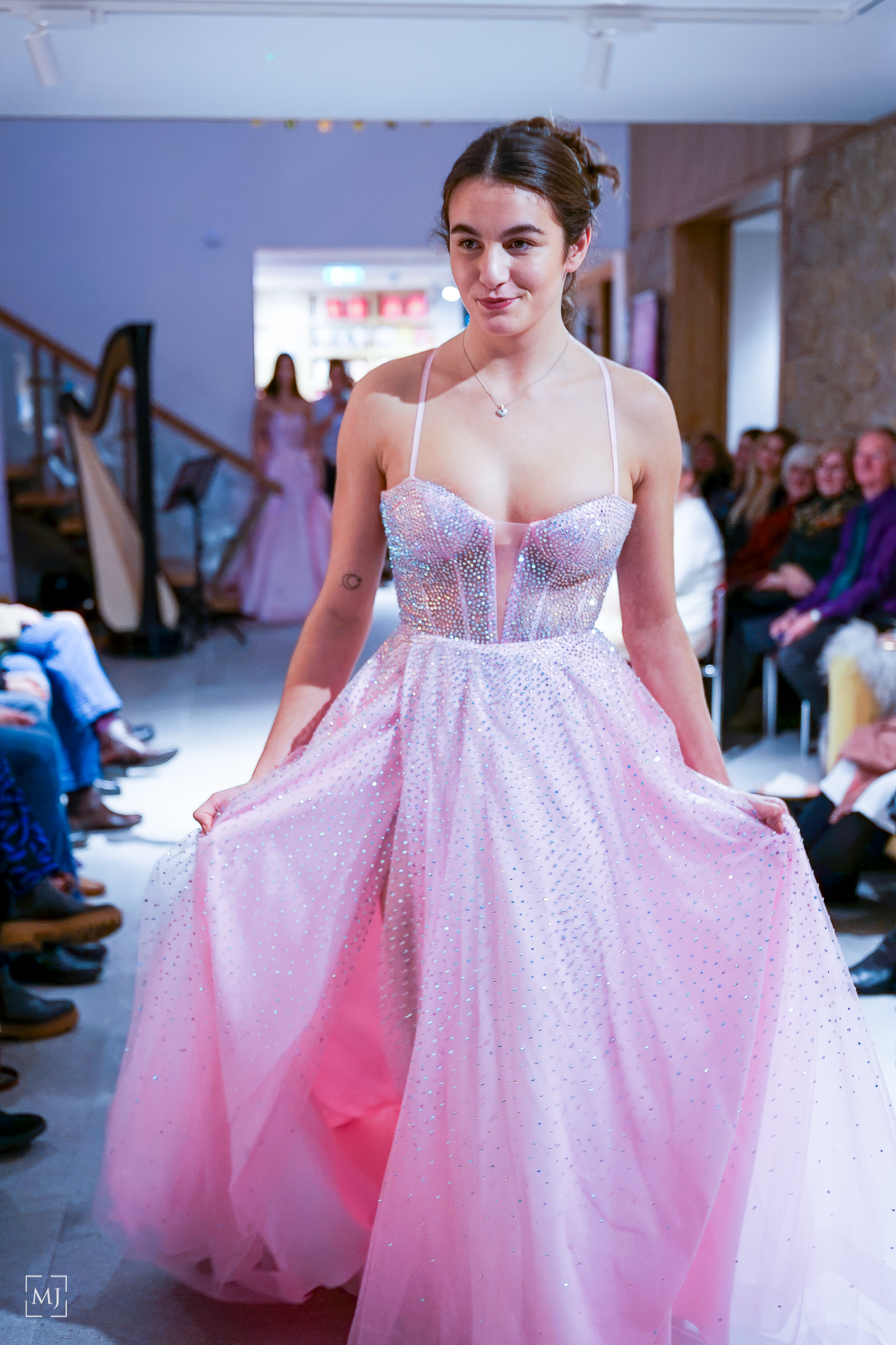 Pink tulle ball gown with sparkly bodice shown from multiple angles on fashion runway. Fashion Photographer Martin Japheth