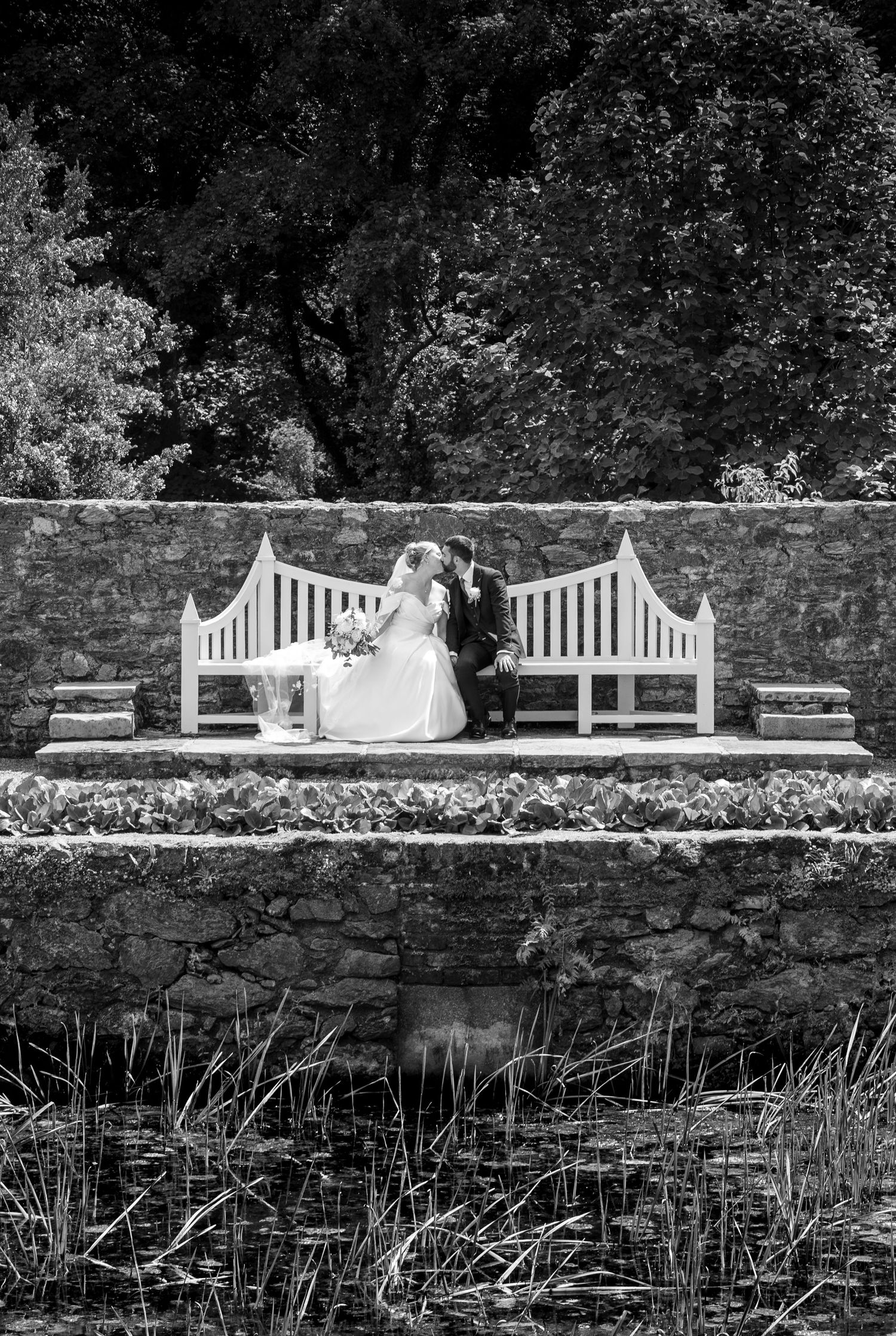 Editorial wedding portrait above the Menai Strait with Eryri beyond, Plas Cadnant, Anglesey