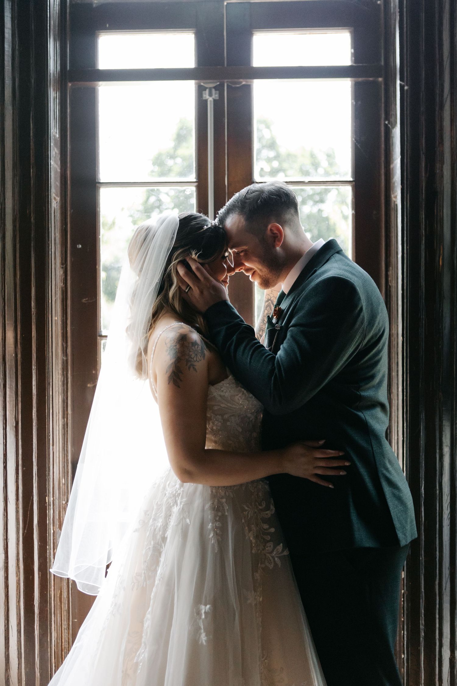 Intimate wedding photography sequence showing tender moments near sunlit windows.