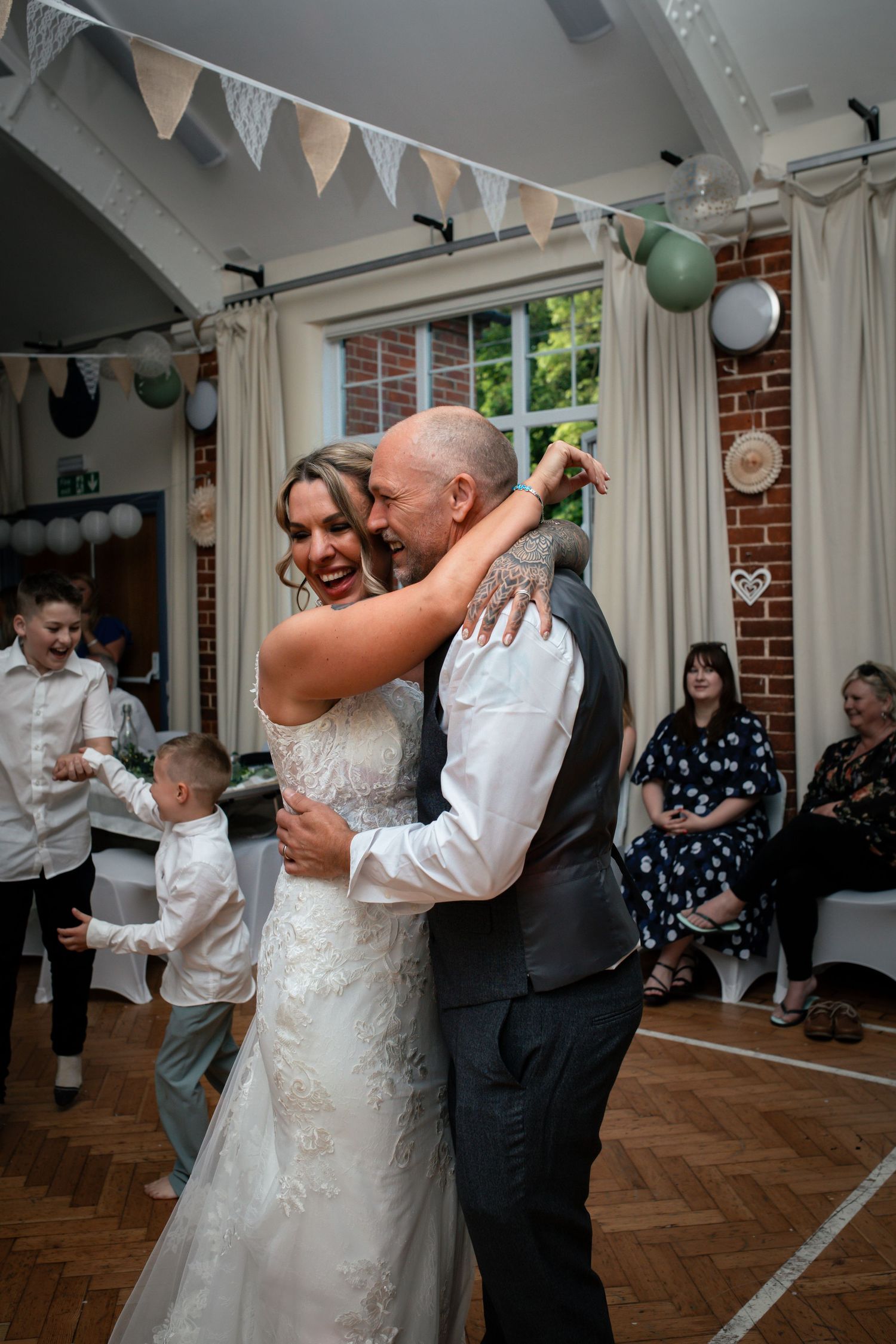 Couple shares an intimate dance moment at their wedding reception.