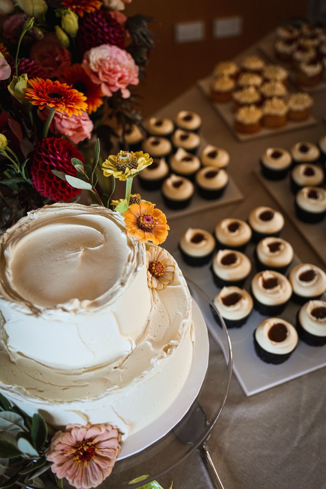 Wedding cake and dessert table at wedding