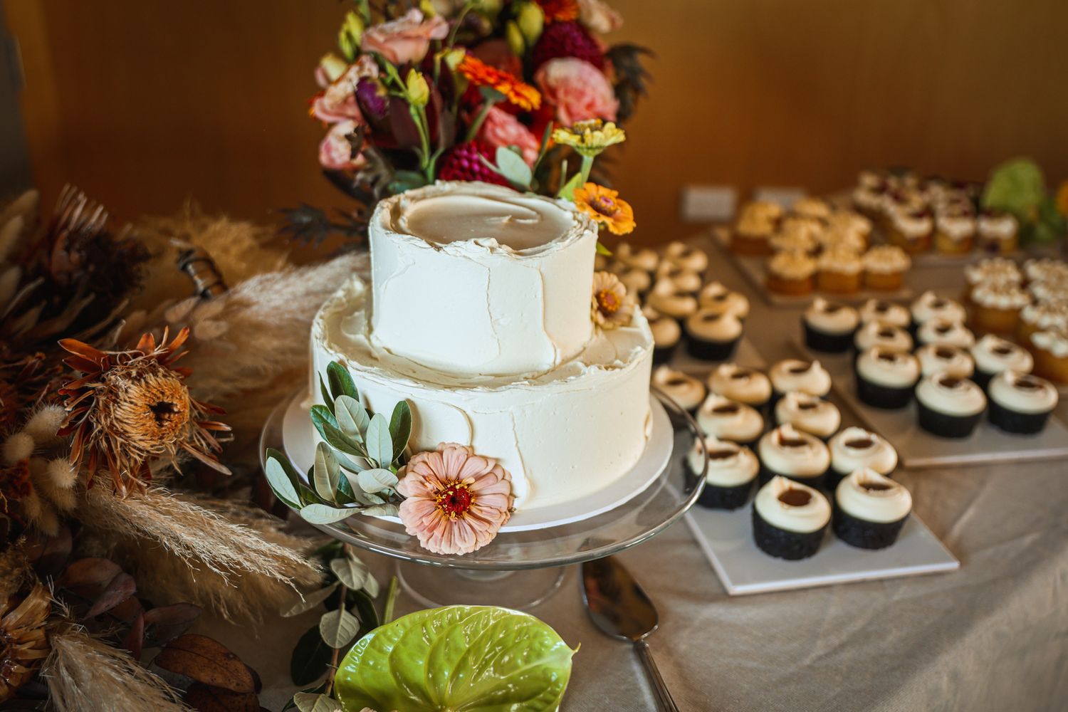 Wedding cake and dessert table at wedding