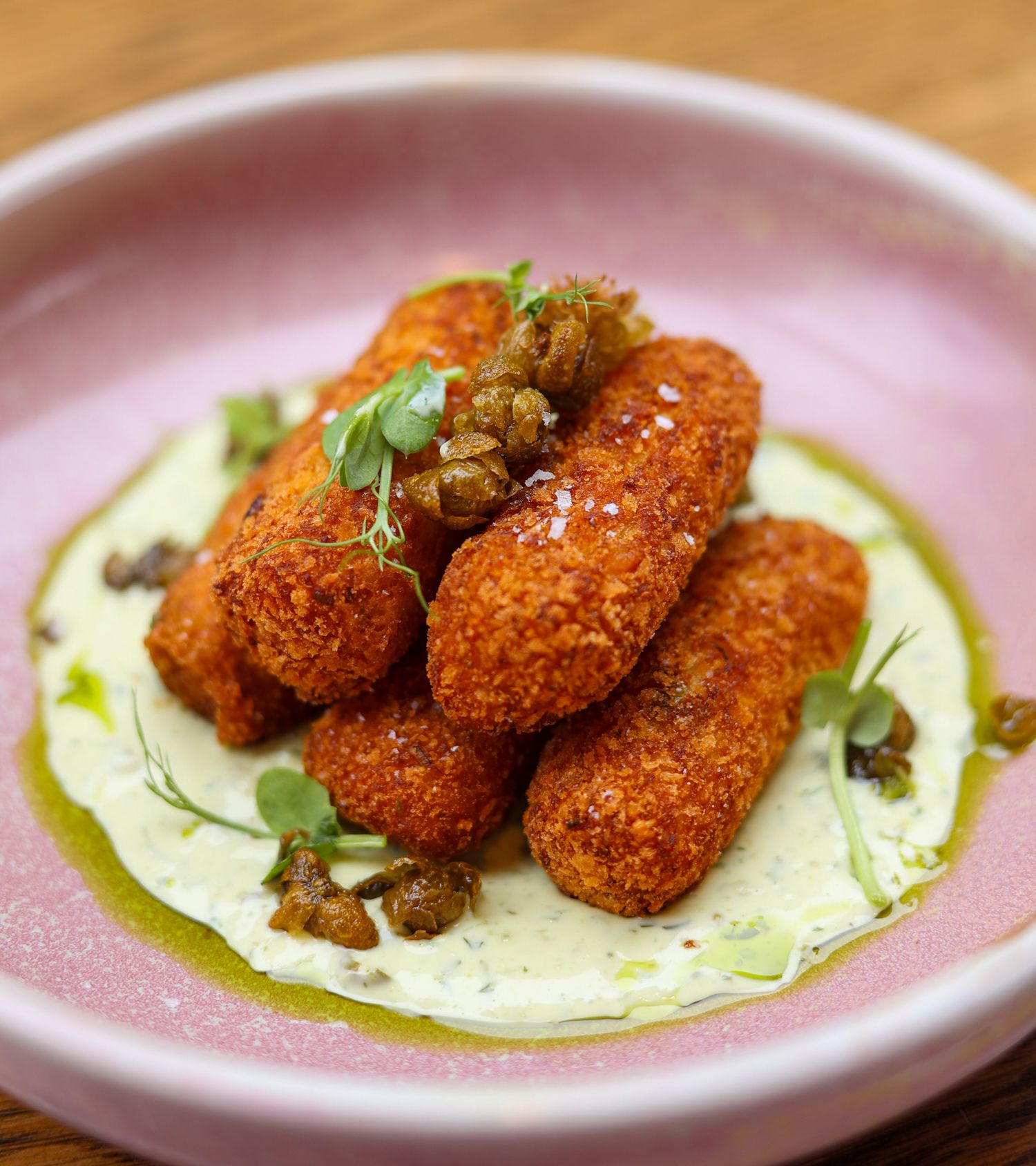 Crispy golden fried fish croquettes at Mr. Brightside Rooftop Bar, Christchurch