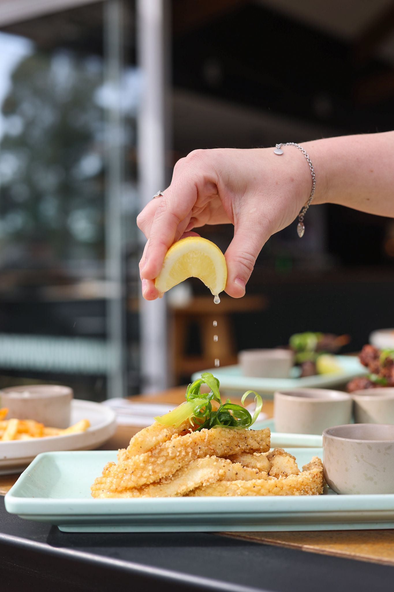 Lemon zest over calamari at Thirsty Acres, Kirwee